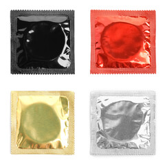 Set with condoms in packages on white background, top view