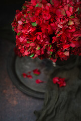 Bouquet of Red Hydrangeas in a Silver Vase on a Silver Tray