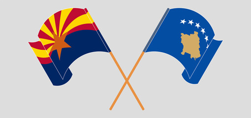 Crossed and waving flags of the State of Arizona and Kosovo