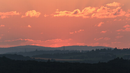 sunset over woods