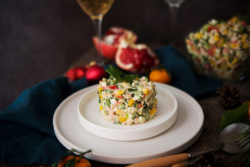 New Year's holiday salad with mayonnaise, New Year's table, champagne