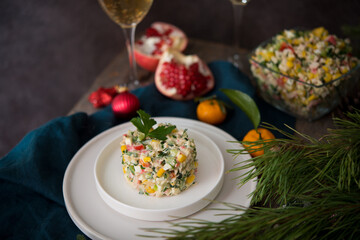 New Year's holiday salad with mayonnaise, New Year's table, champagne