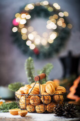 Christmas sweets cookies nuts with condensed milk on the festive table, Christmas decorations