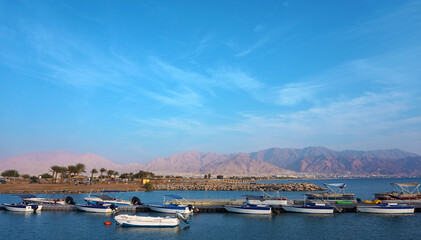   boats in the red sea against the background of mountains      