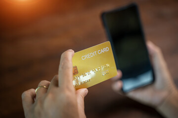 Payment transaction with card,Man holding credit card,Paying bills In internet,Shopping...