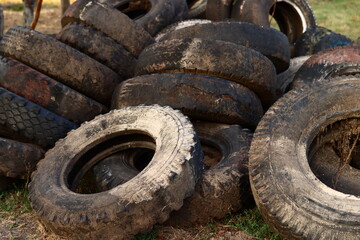 old dirty car tires on the ground