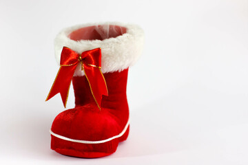 Red, white Christmas boots on a light background