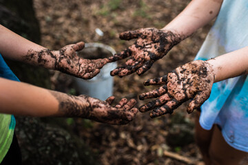 Muddy dirty hands