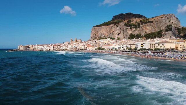 Cefalu, Sicily, Italy - drone shot of the cityscape while sunset.