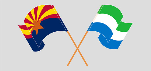 Crossed and waving flags of the State of Arizona and Sierra Leone