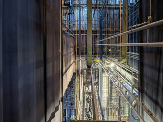 Technical equipment at the backstage of theater. Stage spot lighting rigging structure for a live musical theater events