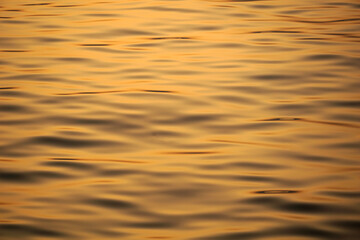 Abstract photo illustration of sea surface at sunset