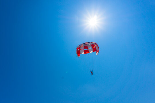 Parashute on a clear blue sky