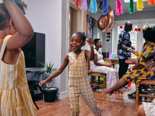 Girls dancing at family birthday party