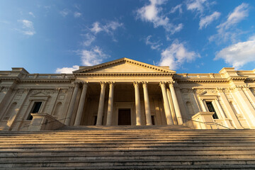 Obraz premium the pantheon greek architecture in Rome Italy golden hour. Blue sky white clouds low angle view
