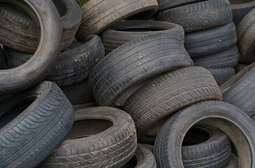 Obraz premium Dump of old car tires, texture. Close-up