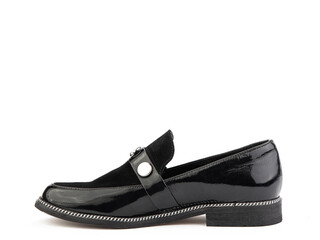 Vintage Women's Loafer Shoes. Closeup. Advertising shot. Leather black shoes with suedei nsert ....
