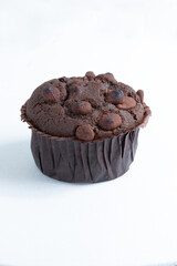 Chocolate muffin isolated on white background.