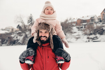 Happy loving family! Father and his baby are playing and hugging outdoors. Little child and daddy...
