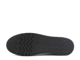 Black leather classic sneakers with laces. Casual women's style. Black rubber soles. Isolated close-up on white background. Shoe sole view. Fashion shoes.