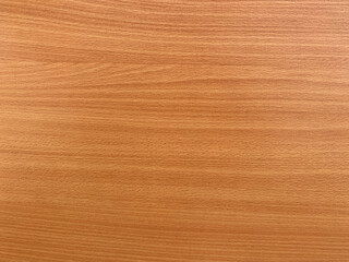 The texture of the wooden surface of a yellow background with thin horizontal lines. Production of parquet boards.
