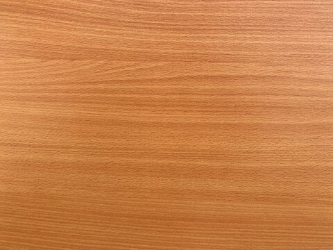 The texture of the wooden surface of a yellow background with thin horizontal lines. Production of parquet boards.