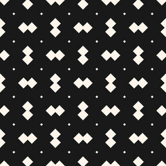 Vector geometric seamless pattern. Black texture with with diamond, rhombus, dots. Geometry abstract graphic design. Subtle minimalist white and black background. Modern design for fabric, wallpaper