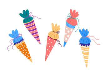 Set of colourful school cones, cornets for the first day of school, german tradition for children going to first grade.