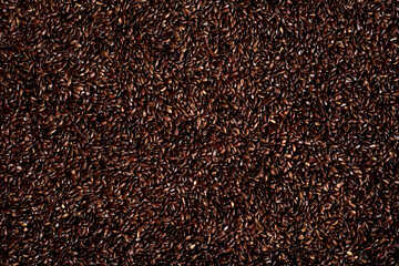 Toasted flax seeds. Full screen top view