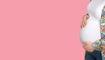 Pregnant woman on a pink background web banner.