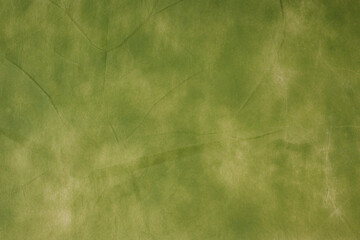 The surface of the green cloth paper is not always the same color.