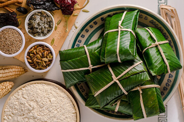 Guatemalan tamales, with dough and all its ingredients.
