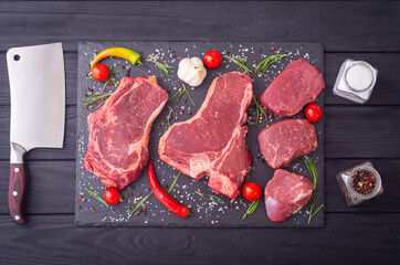 Assortment of beef steak . T-bone , ribeye and fillet mignon