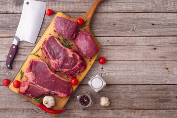 Assortment of beef steak . T-bone , ribeye and fillet mignon