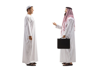Full length profile shot of arab men having a conversation