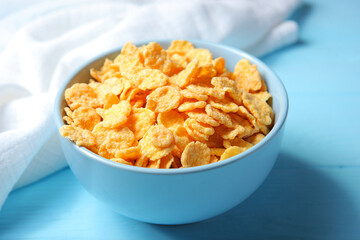 Delicious cornflakes in a plate on the table. 
