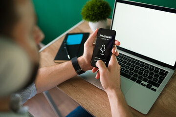 Young man enjoying a podcast on his phone