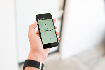 Person using the navigation map on the phone