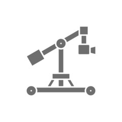 Digital movie camera on dolly rails grey icon.