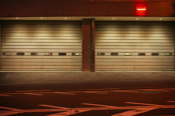 Tokyo,Japan - September 1, 2021: Closed gates of fire department at night in Tokyo
