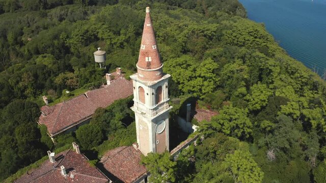 Aerial view of the plagued ghost island of Poveglia in the Venetian lagoon, opposite Malamocco along the Canal Orfano near Venice, Italy.