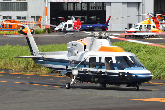 Tokyo, Japan - August 11, 2021:Aero Asahi Sikorsky S-76C (JA06HD) utility helicopter.