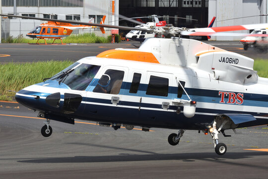 Tokyo, Japan - August 11, 2021:Aero Asahi Sikorsky S-76C (JA06HD) utility helicopter.