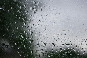 Drops on glass macro effect. Rainy day