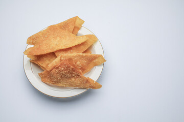 Fried wontons with minced pork meat on white background. Asian Style food appetizer. Chinese food,asian food.