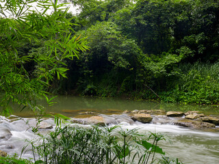 A small waterfall of a swaying stream. 
