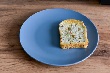 Toast bread in a plate on vintage wooden background