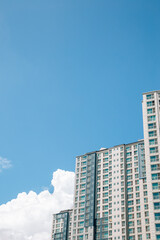 Fototapeta premium Modern apartment building and cloudy sky in Suwon, Korea