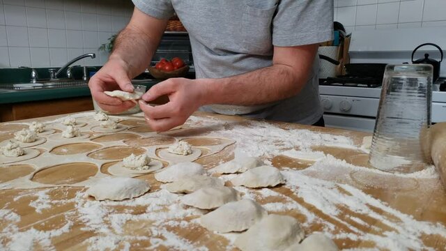 Home cooking - Time lapse of making potato and cheese pierogi using home kitchen and table