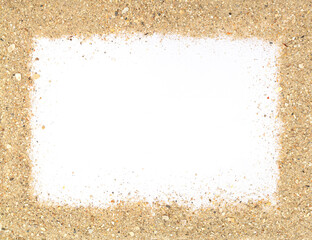 Frame made of sea sand and broken shells, isolated on white background with copy space for text. Summer vacation concept near the sea